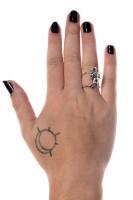 Silvery ring with a saber-toothed smilodon cat skull, witch occult gothic